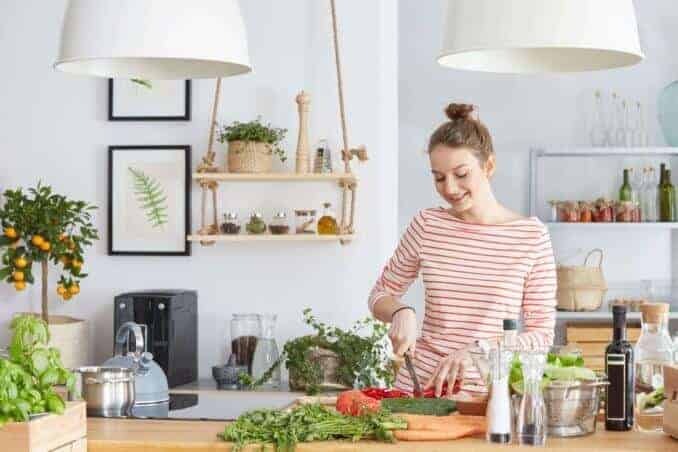 Woman cutting vegetables