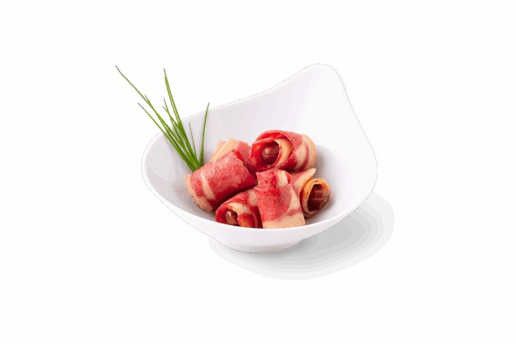 Speck umwickelte datteln in schale